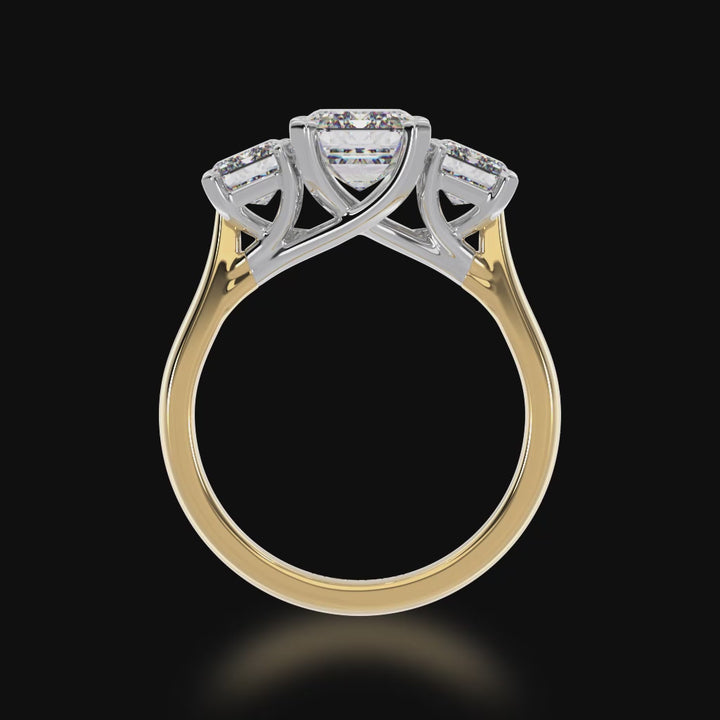 Trilogy emerald cut diamond ring on yellow gold band 3d video
