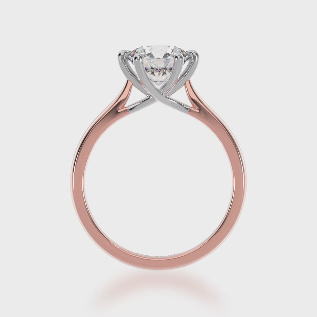Oval cut diamond solitaire ring on rose gold band 3d view