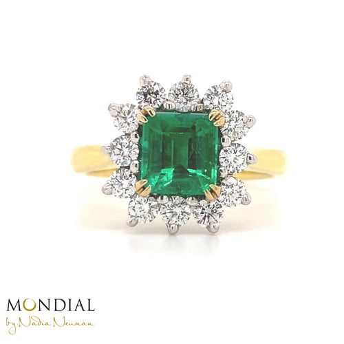 Square cut emerald diamond halo ring on yellow gold band