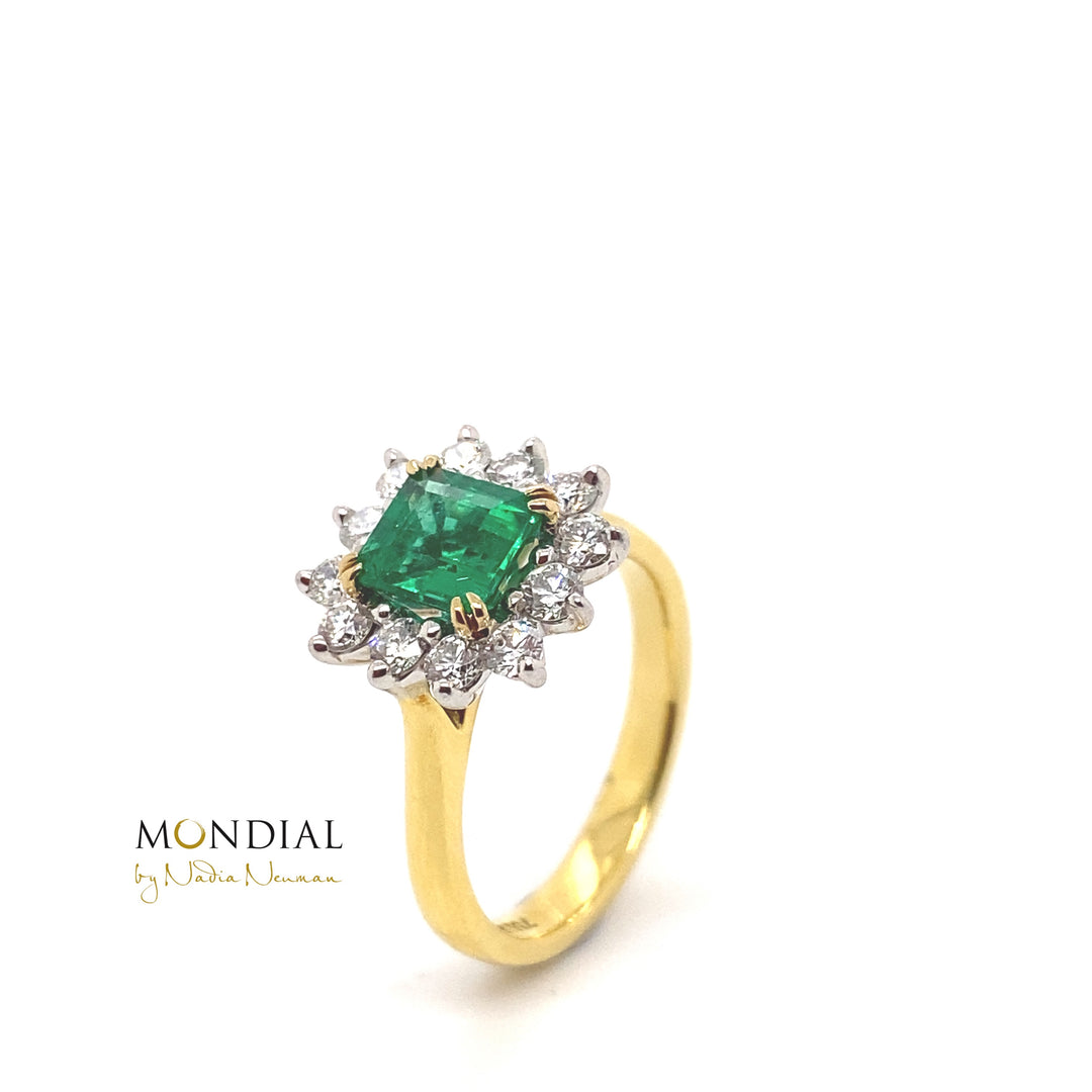 Square cut emerald diamond halo ring on yellow gold band