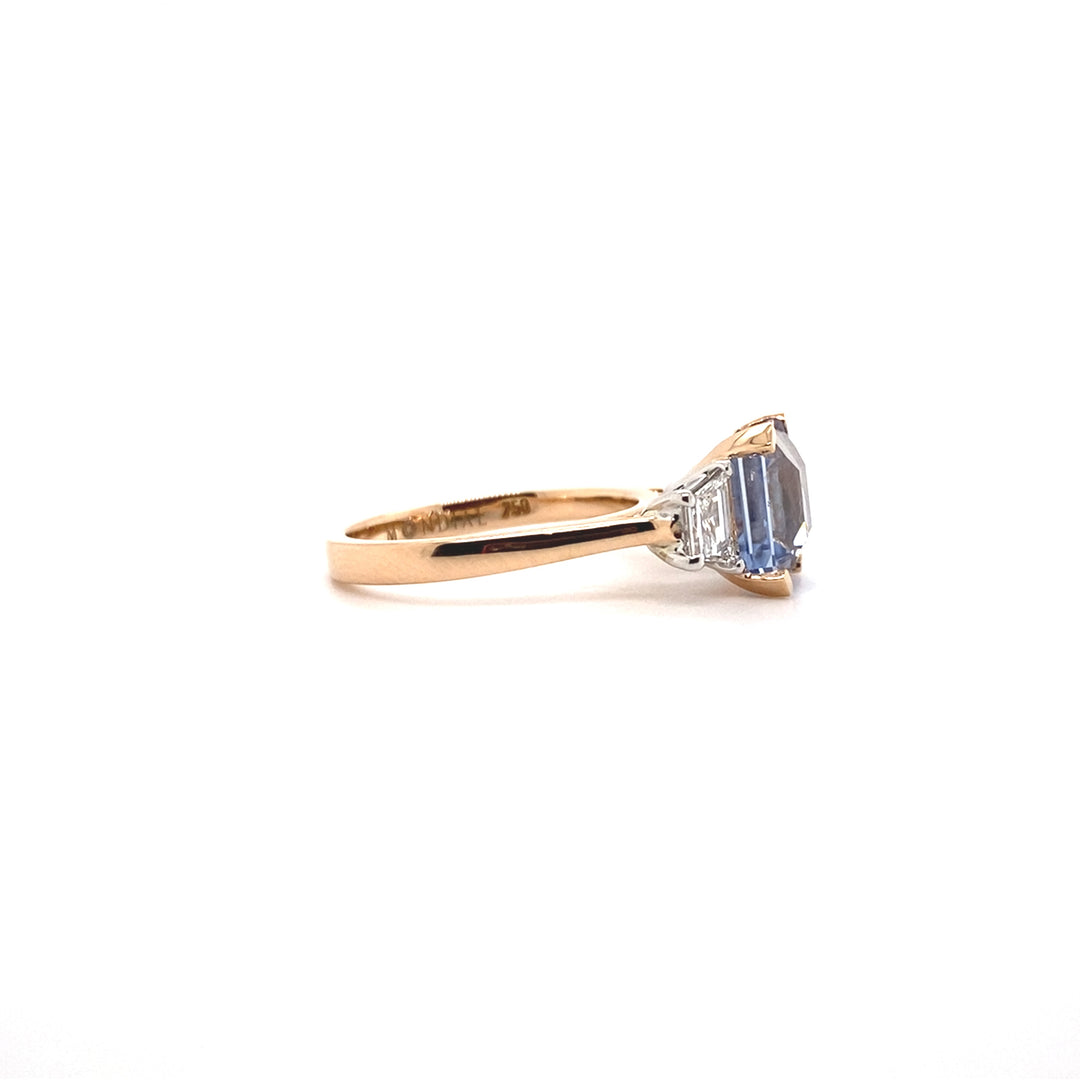 Trilogy square cut blue sapphire and diamond ring on rose gold band