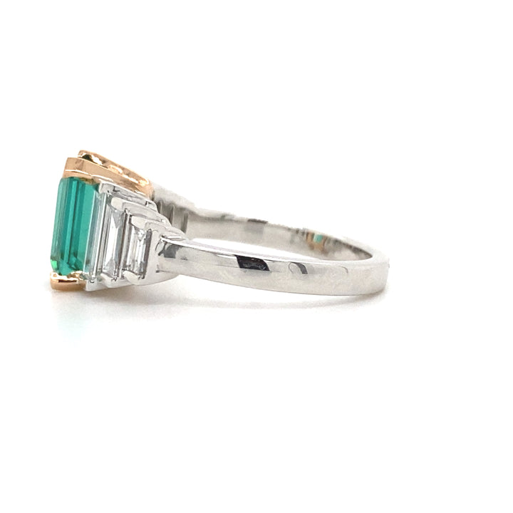 Manhattan design emerald cut tourmaline and diamond ring on white gold band