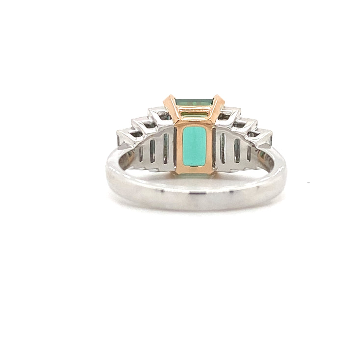 Manhattan design emerald cut tourmaline and diamond ring on white gold band