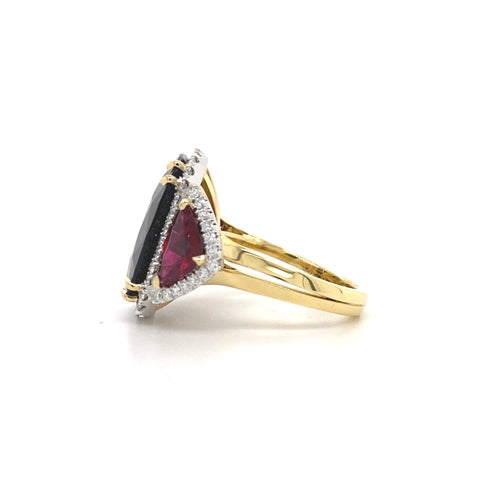 Trilogy cushion cut black sapphire and ruby ring on rose gold band