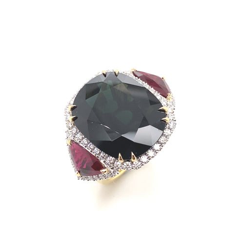 Trilogy cushion cut black sapphire and ruby ring on rose gold band