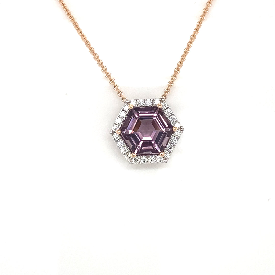 Hexagon cut spinel and diamond halo pendant view from front