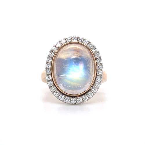 Oval cut moonstone diamond halo ring on rose gold band