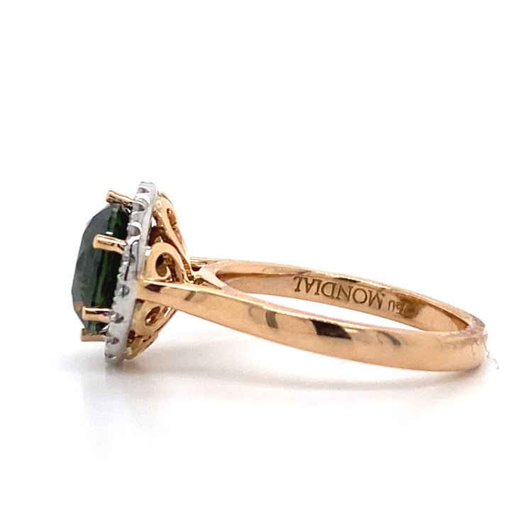 Round brilliant cut green sapphire diamond halo ring on rose gold band