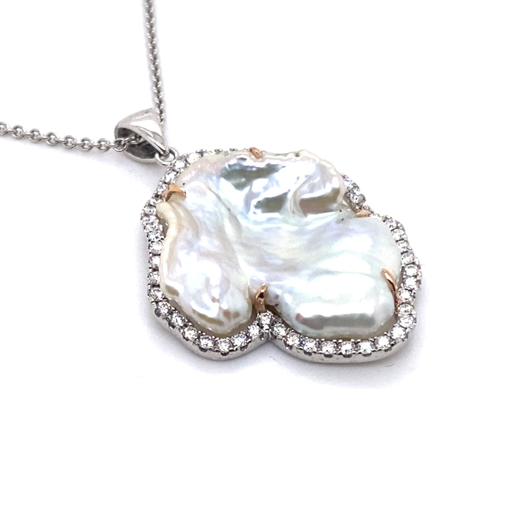 Fresh water pearl diamond pendant view laying flat 