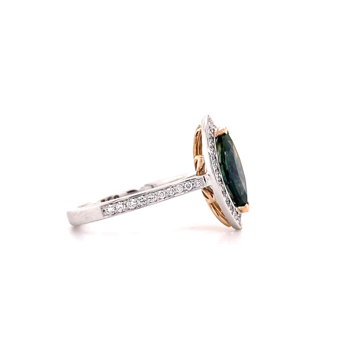 Marquise cut green sapphire diamond halo ring with diamond set band