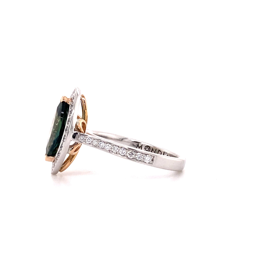 Marquise cut green sapphire diamond halo ring with diamond set band