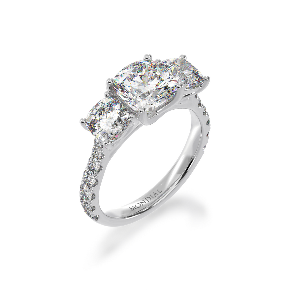 Trilogy cushion cut diamond ring with diamond set band view from angle