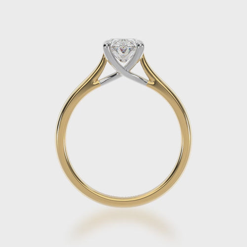 Oval cut diamond solitaire in yellow and white gold 3d view.