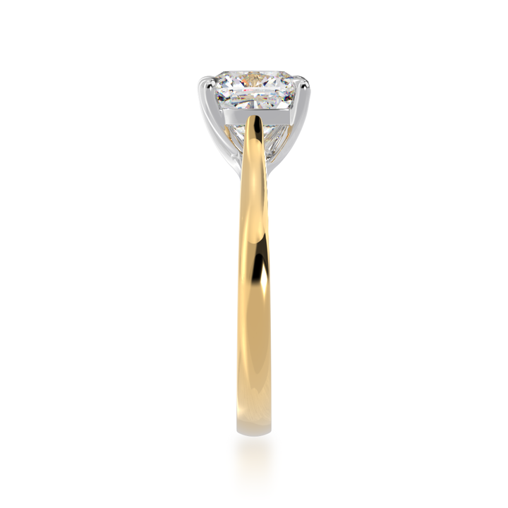Cushion cut diamond solitaire ring on yellow gold band view from side