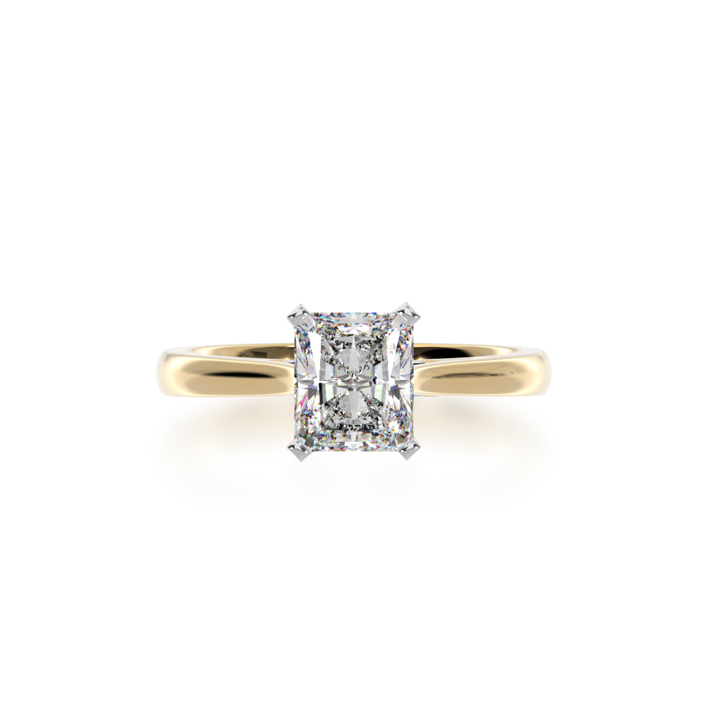 Radiant cut diamond solitaire ring on yellow gold band view from top