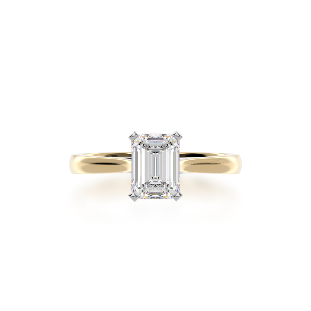 One Emerald cut diamond solitaire in yellow and white gold from above