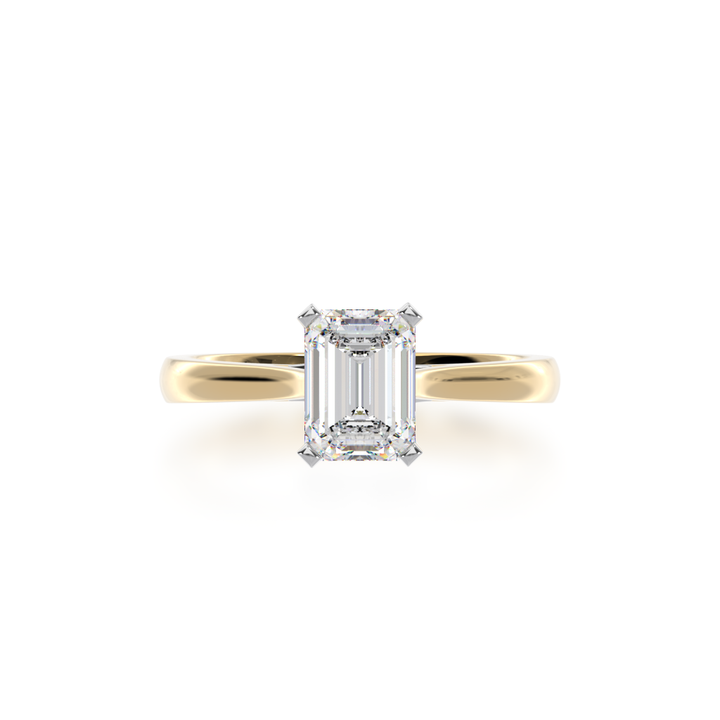 One Emerald cut diamond solitaire in yellow and white gold from above