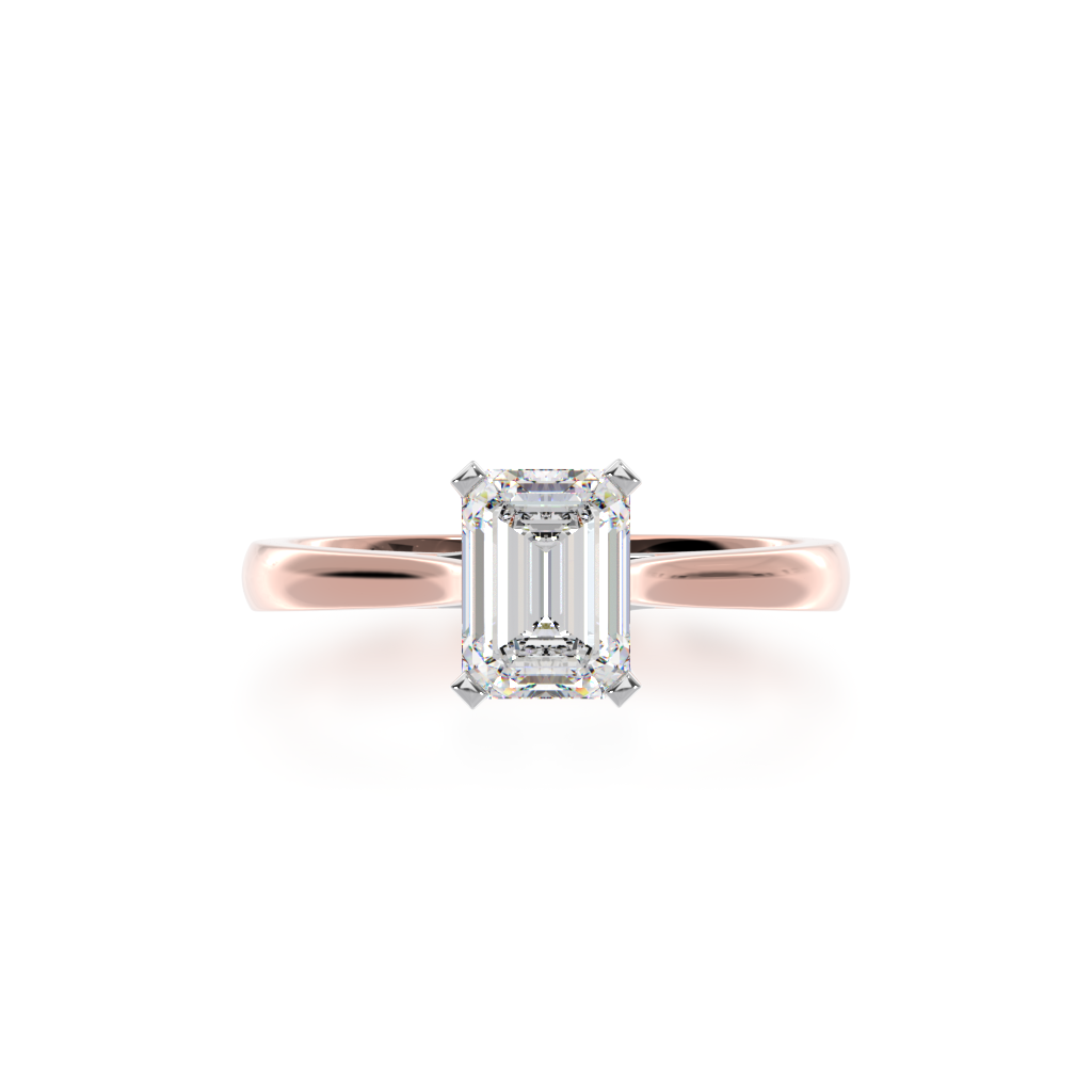 Emerald cut solitaire diamond ring on rose gold band view from top