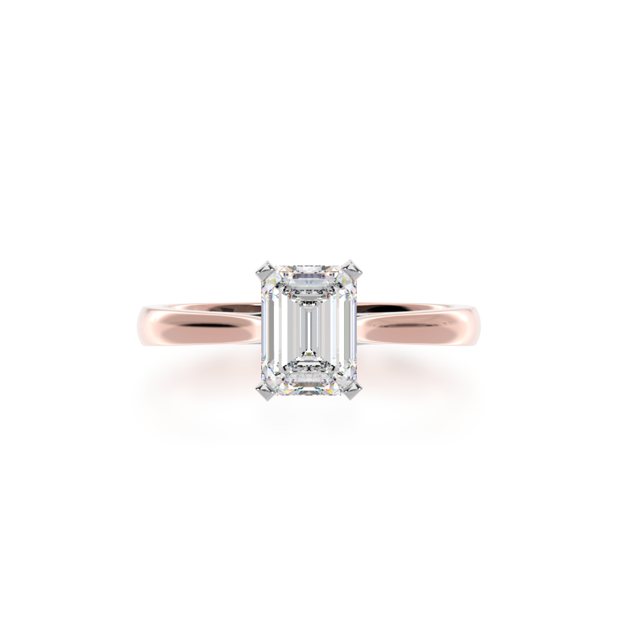 Emerald cut solitaire diamond ring on rose gold band view from top