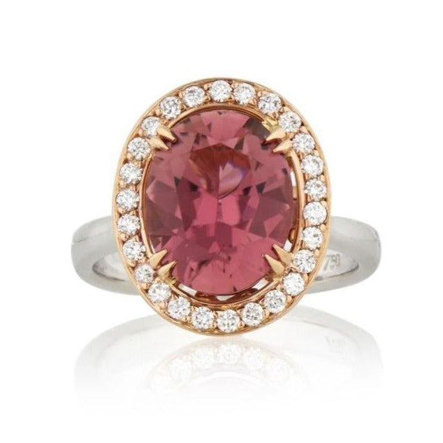 Oval cut pink tourmaline diamond halo ring on white gold band