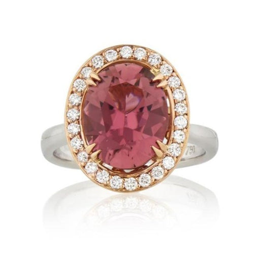 The Mondial by Nadia Oval diamond ring with a pink tourmaline diamond and halo on white gold band.