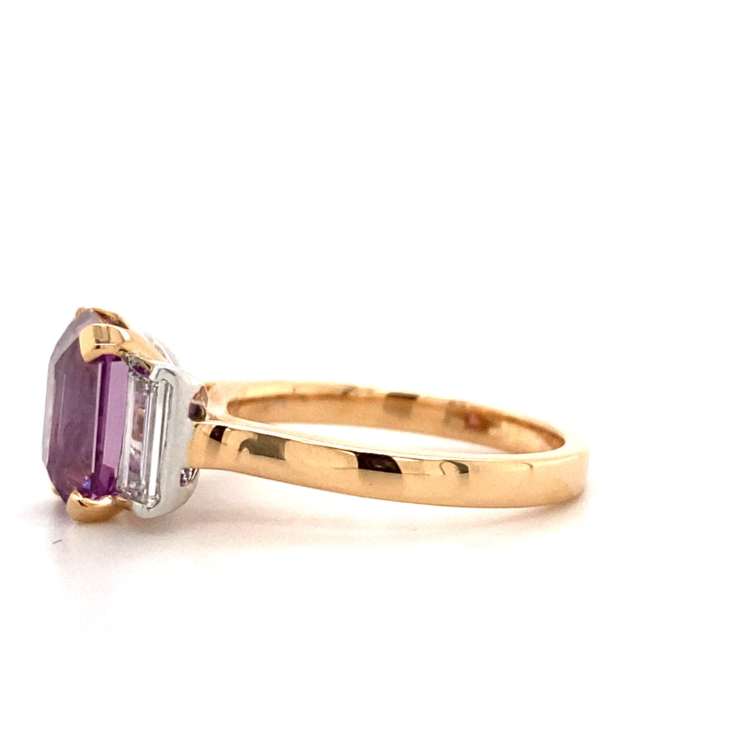 Trilogy emerald cut purple sapphire and diamond ring on rose gold band