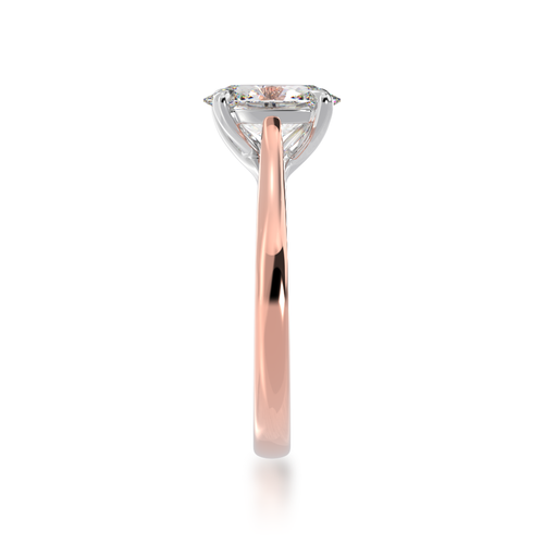 Oval cut diamond solitaire ring on rose gold band view from side.