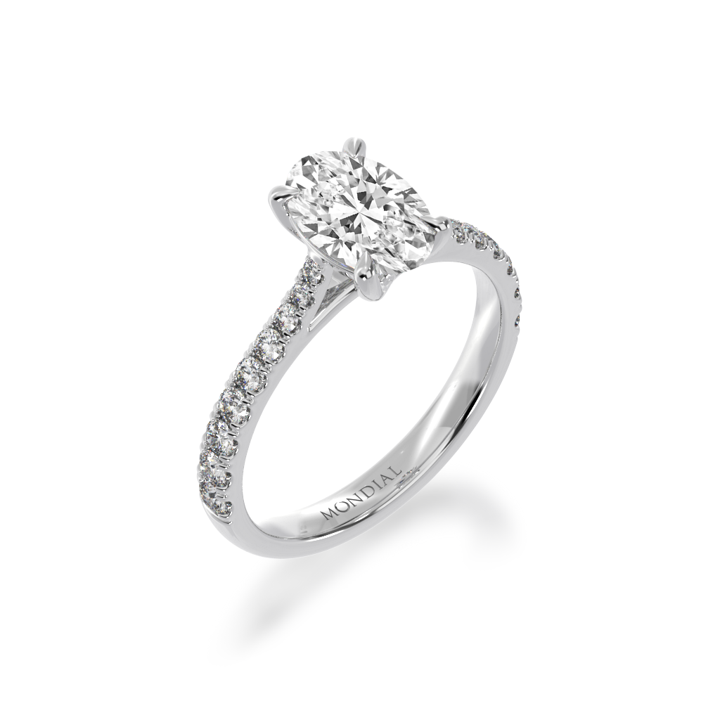 Oval cut diamond solitaire with a white gold diamond set band from an angle view