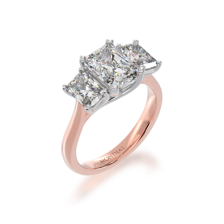 2 Carat Diamond Ring. Trilogy radiant cut diamond ring on rose gold band view from angle 