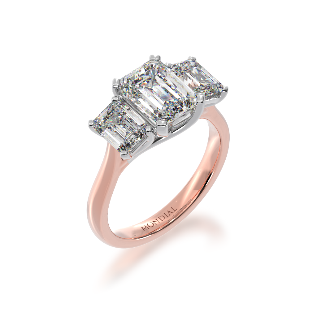 Trilogy emerald cut diamond ring on rose gold band view from angle 