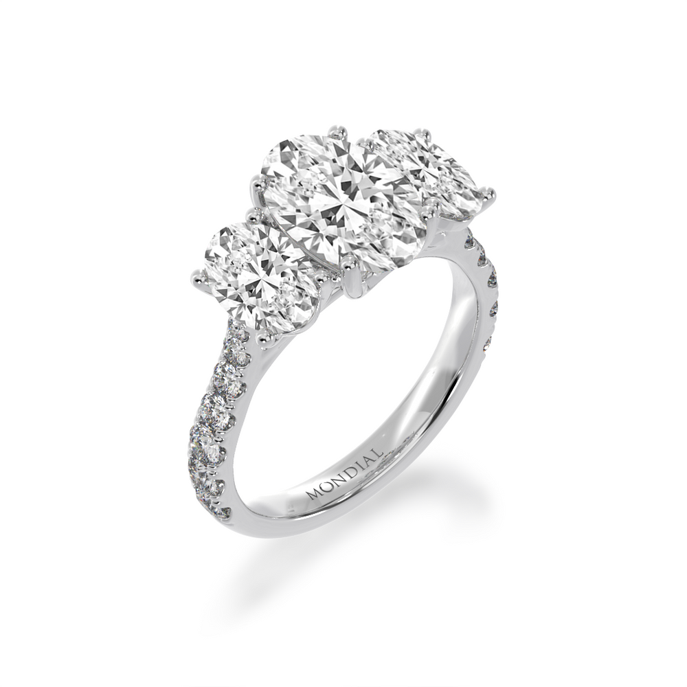 Trilogy oval cut diamond ring with diamond set band view from angle 
