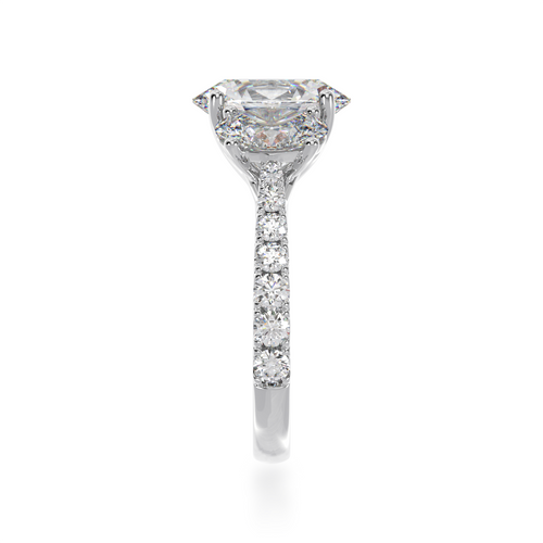 Trilogy oval cut diamond ring with diamond set band view from side.