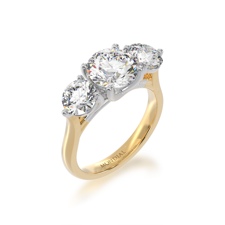 Trilogy 3 Stone Engagement Ring in Yellow Gold on angle