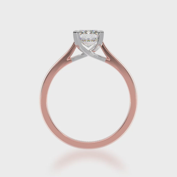 Emerald cut solitaire diamond ring on rose gold band 3d video
