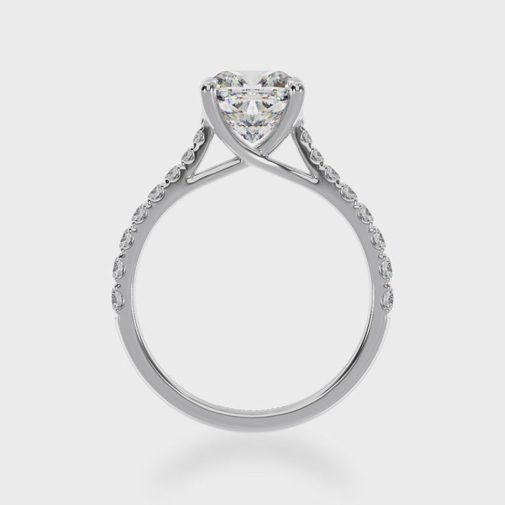 Cushion cut diamond solitaire ring on yellow gold band 3d video