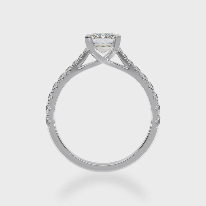 Emerald cut Diamond Solitaire with a white gold diamond set band 3d view